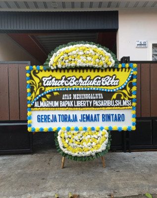 Papan Bunga Duka di Rambang Senuling